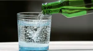 Pouring-glass-of-sparkling-water